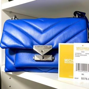 Periwinkle blue quilted MK leather purse